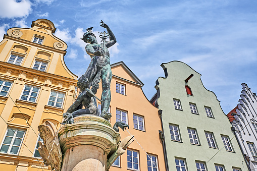 Augsburg, Germany - June 04, 2023: Merkur Fountain in Augsburg on Maximilianstrasse