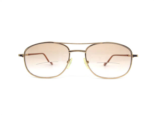 istock Bifocal glasses isolated on white background. 1513669048