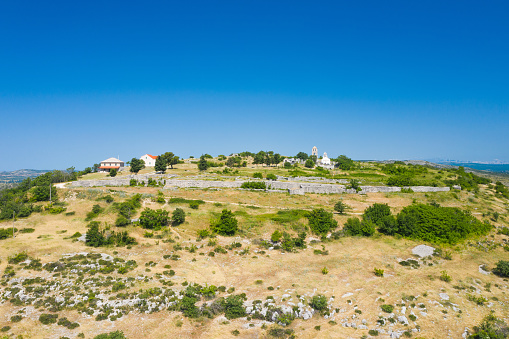 Aerial view of ancient Varvaria historic site on the hill, Dalmatia, Croatia