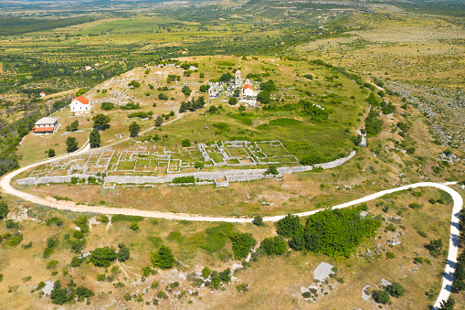 Aerial view of ancient Varvaria historic site on the hill, Dalmatia, Croatia