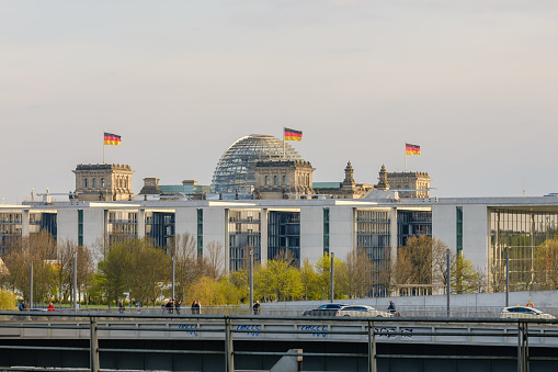 Berlin, Germany - April 19, 2023 : View of the Reichstag, the German parliament and other governmental buildings in Berlin Germany