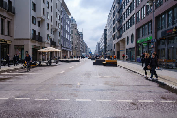 Berlin, Germany - April 19, 2023 : Panoramic view of the pedestrian popular street, Friedrichstrasse, in the center of Berlin Germany