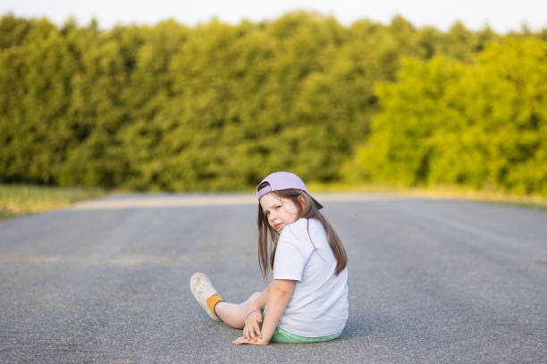 istock Young Girl on Road 1513723332