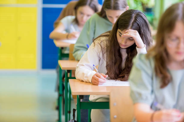 istock Female high school students during exam 1513728156