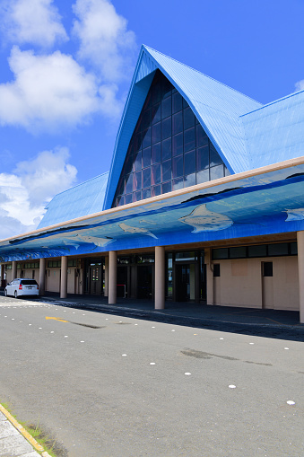 Ngetkib, Airai State, Babeldaob Island, Palau Islands: Palau International Airport / Roman Tmetuchl International Airport / Koror Airport - main terminal, land side entrance - architecture inspired in the indigenous buildings.