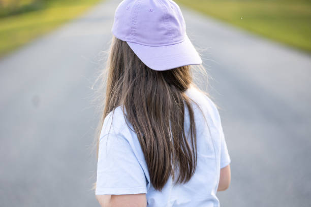 istock Young Girl with Poppies 1513729203