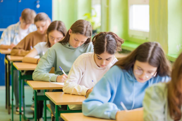 istock Female high school students during exam 1513730270