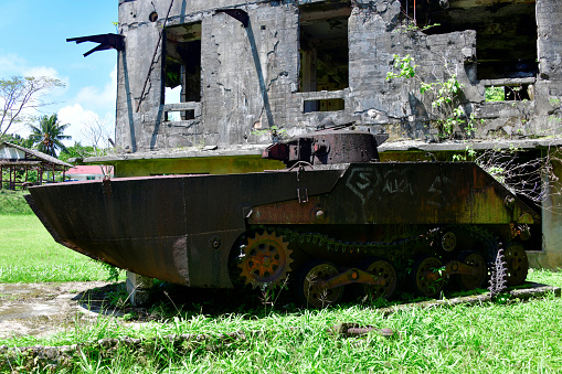 Yelch, Airai State, Babeldaob Island, Palau: the Special Type 2 Launch Ka-Mi ('特二式内火艇　カミ') was the first amphibious tank of the Imperial Japanese Navy (IJN) -  seen with the front flotation pontoon at the Japanese Communications Center ruins, Kaigun Sho. This particular tank was buried by the Japanese Military in the last days of the Greater East Asia War ('大東亜戦争').