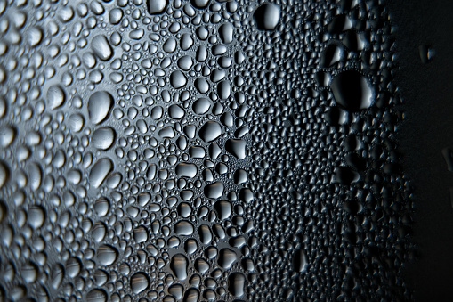 Multiple condensation drops on glass