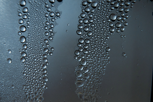 Small bubbles of water condensation on glass kettle