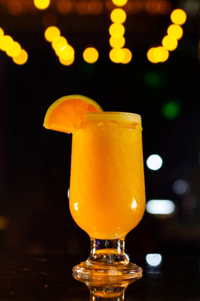 Citrus Refreshment: Orange Juice at Night Bar