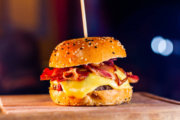 istock Delicious Bacon Cheeseburger on Sesame Seed Bun 1513770023