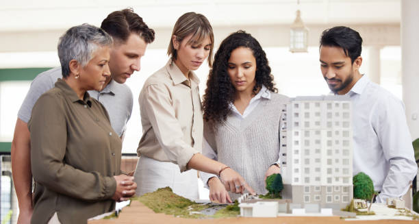 istock Architecture, apartment model or engineering team in meeting for development project planning. Group collaboration, creative people or communication with senior manager and women for office building 1513772858