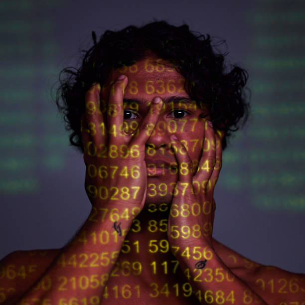 Portrait, beauty and code for facial recognition, genetic splicing or ai technology with a man on a dark background in studio. Face, skincare and numbers with a cyborg or android becoming self aware retrato, belleza y código para reconocimiento facial, empalme genético o tecnología de inteligencia artificial con un hombre sobre un fondo oscuro en el estudio. cara, cuidado de la piel y números con un cyborg o androide que se vuelve consciente de s�