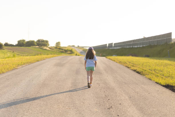 Only One Young Girl on the road.\nCracovia. Poland.