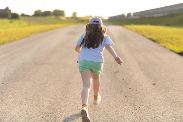 istock Young Girl on Road 1513778904