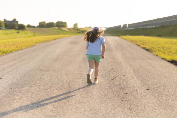 Only One Young Girl on the road.Cracovia. Poland.