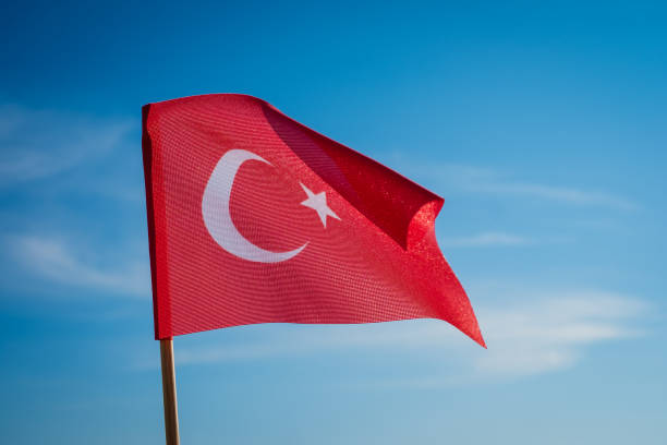 istock Turkish flag waving in wind and sunlight. 1513780574