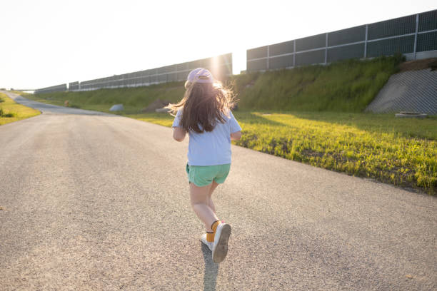 istock Young Girl on Road 1513782230