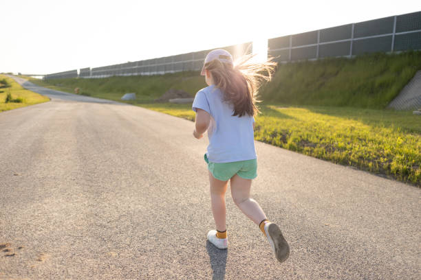 istock Young Girl on Road 1513782244