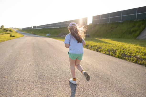istock Young Girl on Road 1513782247