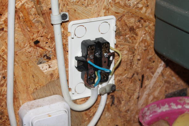 istock Installation of a junction box and an electrical outlet 1513807810