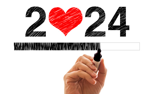 Handwriting 2024 text with heart shape and loading