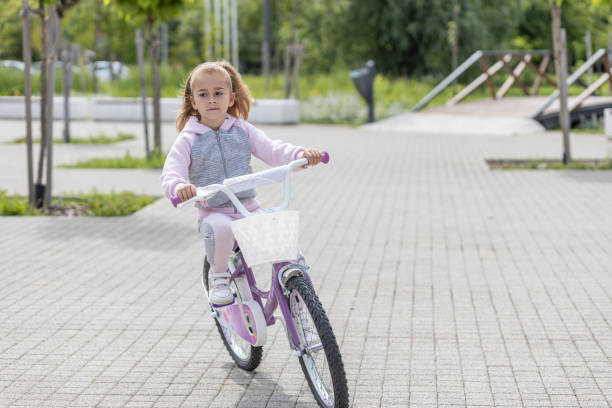 istock Child on a bike 1513891392