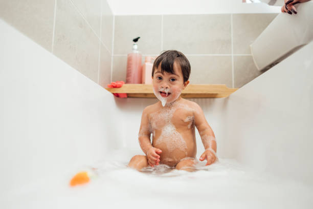 istock Baby Boy's Bath Time Fun 1513900170