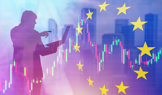 Financial market of European union. Silhouette of investor with laptop. Flag of Europe near businessman. Investments in European union. EU economics. Financial background for EU. 3d image