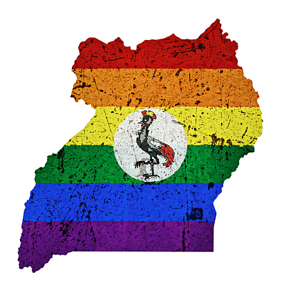 Scratched, distressed map of Uganda overlaid with the multi colored stripes of the gay pride flag and the national symbol of the crowned crane. Map outline adapted from public-domain source at https://commons.wikimedia.org/wiki/File:Un-uganda.png