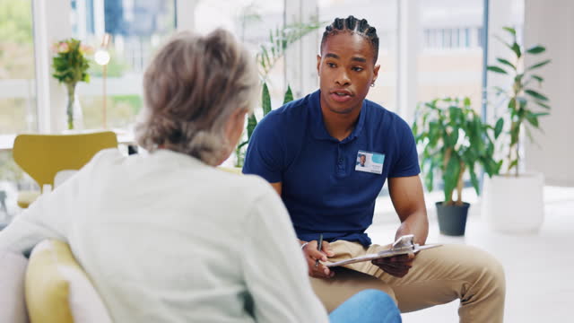 Retirement, documents and a nurse talking to an old woman patient about healthcare in an assisted living facility. Medical, planning and communication with a black man consulting a senior in her home