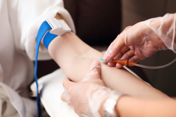 istock Nurse preparing patient for blood draw 1513952166