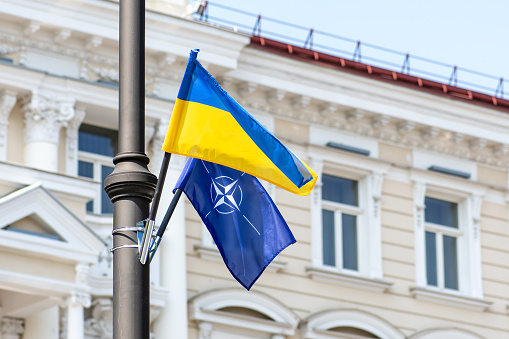 Vilnius, Lithuania - July 4 2023: Flags of NATO and of Ukraine during Nato summit 2023 in the centre of Vilnius, Europe