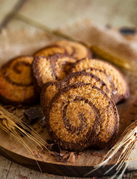 istock Wholemeal biscuits with barley, spelled, oats and chocolate 1513973755