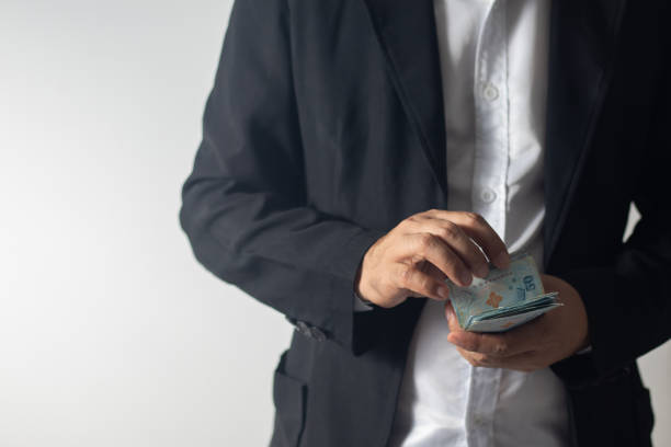 istock Investors are counting banknotes in their hands. 1513993267