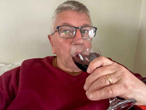 istock Senior Caucasian man drinking red wine 1514028285