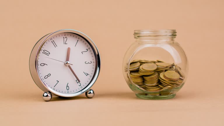 Saving money, coin in glass jar, save money, income, salary, investment, investment profit, dividend, cash flow, daily money, savings concept.