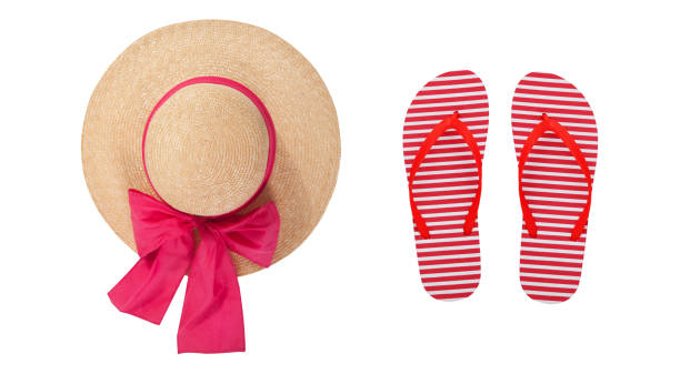 istock Beach accessories flip flops and hat. Summer resort objects collage isolated. 1514047919