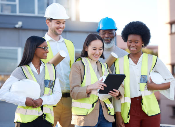 istock Architecture, tablet and people planning, teamwork and collaboration for project management design of blueprint. Construction worker, contractor or engineering manager and team on digital technology 1514048492