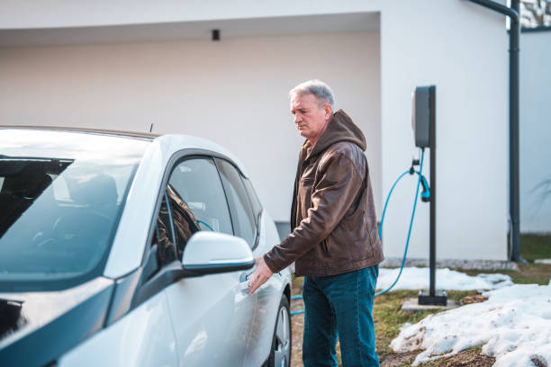 istock Caucasian Man with a Leather Jacket Closing his Car Door 1514078366