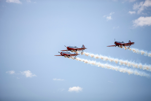 Three Ukrainian Aeroprakt A32 ultralight double aircraft in the sky at the air show in Langaci-Limbazi Airport, Latvia