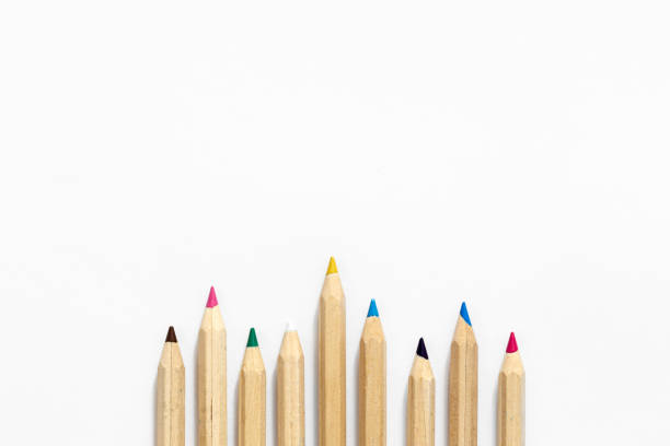istock Wooden multi-colored pencils on a white background, isolated, top view. 1514130324
