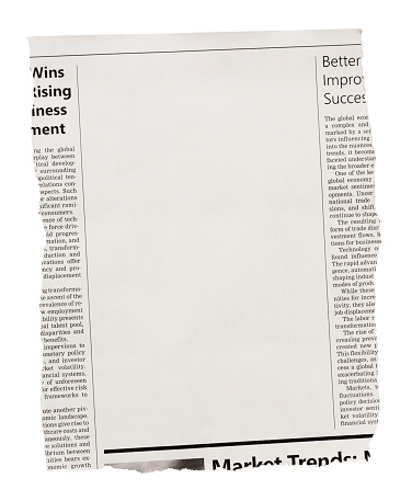 Torn-out piece from a newspaper with blank space for your article, advertisement or picture. The articles are on business topics. The text, layout and photo are simulated by the photographer, so this image is free of third-party copyright and may be used for any purpose.