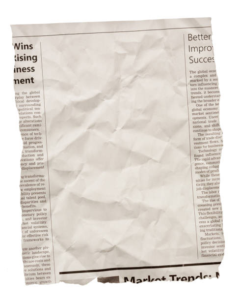 istock Wrinkled newspaper clipping with blank space for your copy 1514168728