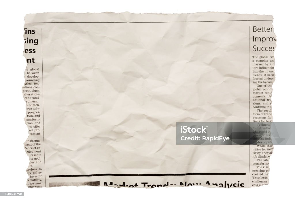 Wrinkled newspaper clipping with blank space for your copy Torn-out piece from a newspaper with blank space for your article, advertisement or picture. The articles are on business topics. The text, layout and photo are simulated by the photographer, so this image is free of third-party copyright and may be used for any purpose. Newspaper Stock Photo