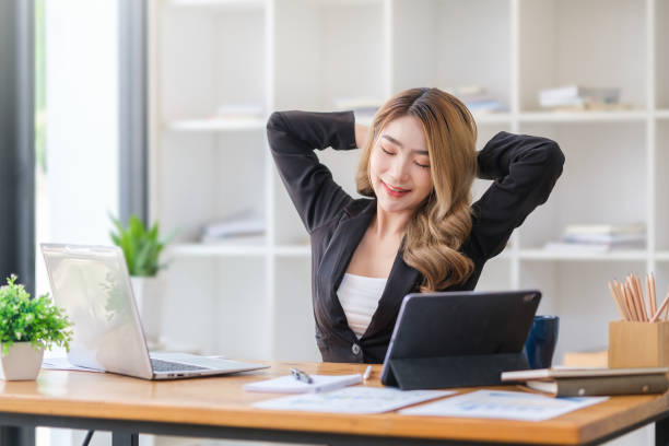 istock Calm hold hands with hands behind head relaxing in comfortable office chair, feels satisfied by work done. 1514171345
