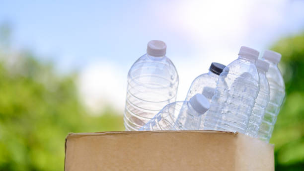 istock Recycling corrugated box 
with used plastic bottles. Zero waste, waste sorting, ecology, concept. 1514178735