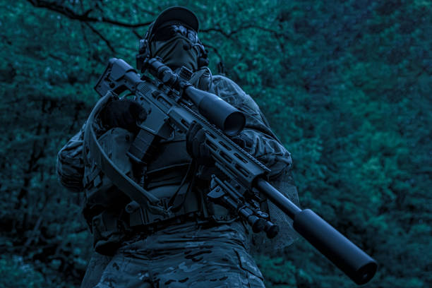 istock Green Berets US Army Special Forces Group sniper in night action 1514178799