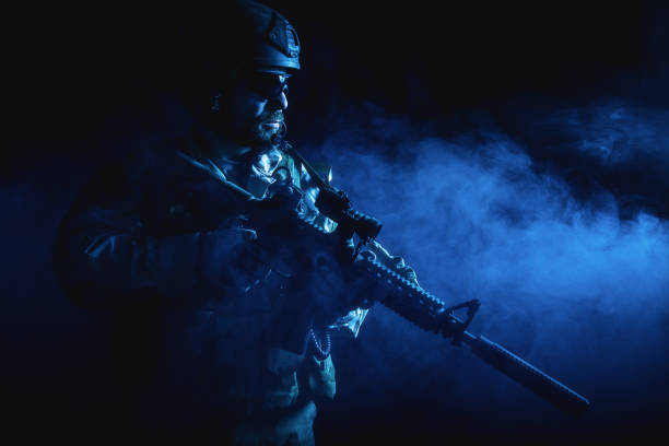 istock Bearded special forces soldier in the smoke 1514178800